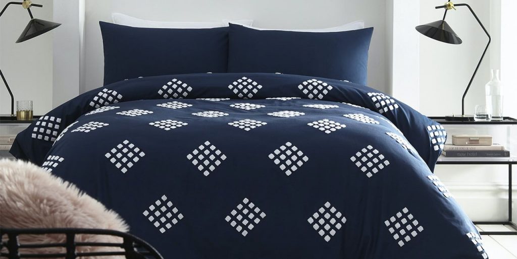 17 navy bedding sets to make your bedroom feel sophisticated - goodhousekeeping.com 